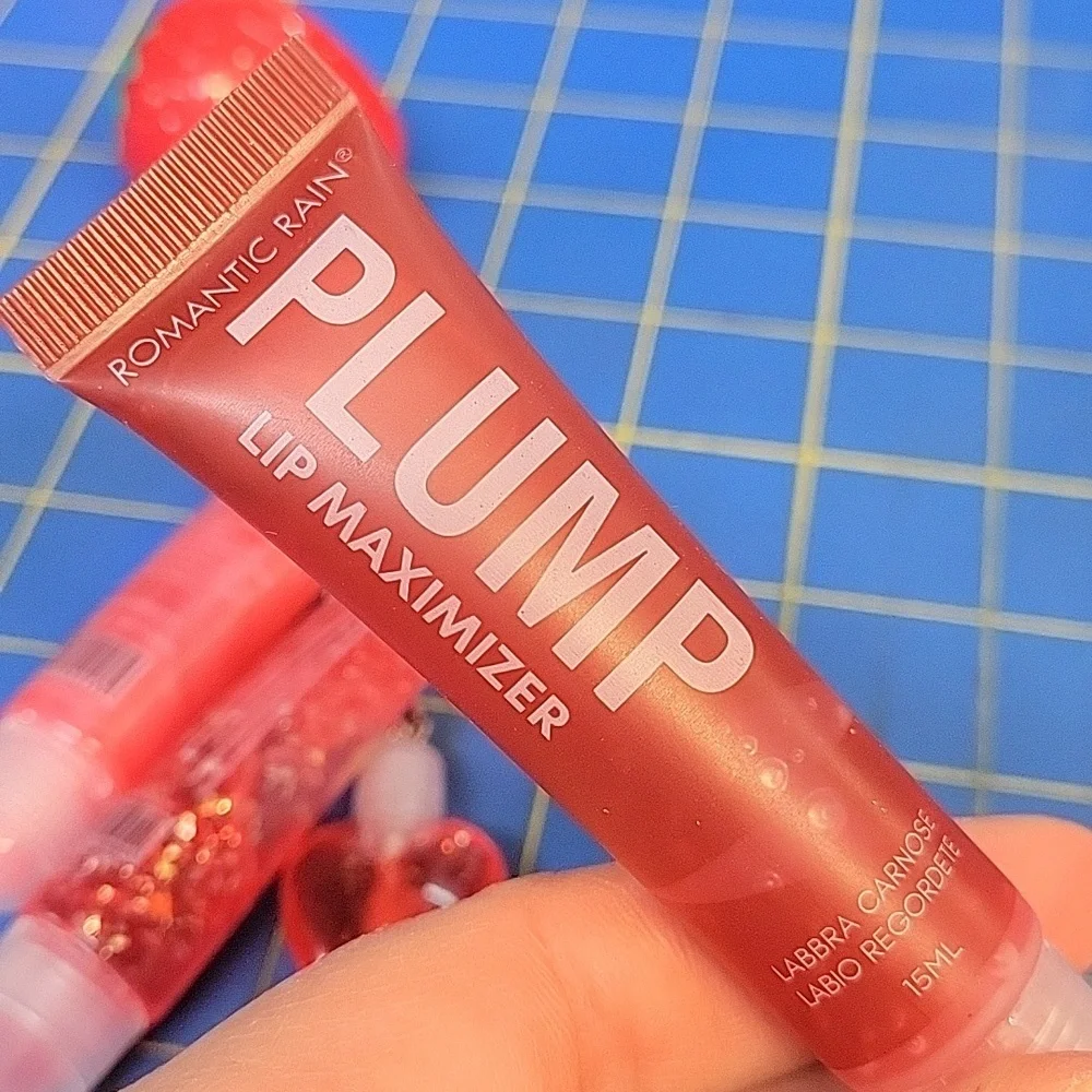 Lot of 4  Lip Gloss & Plumper New